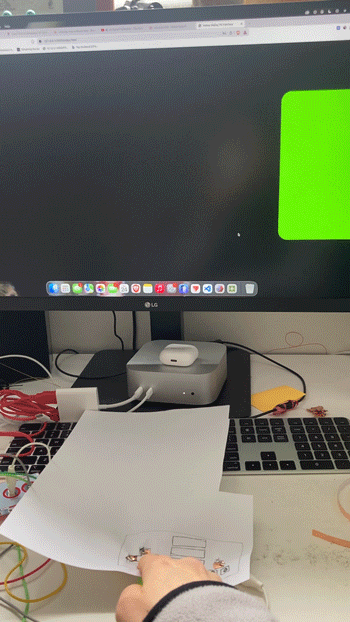 Instead of having the ground wire on my finger, I've placed all the tape and wiring underneath the paper to reduce confusion and make it easier to use.
